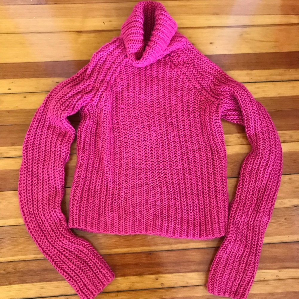 Small pink cozy knitted sweater